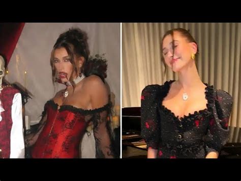 Hailey Bieber shows off model figure in tight red corset, blood-red ...
