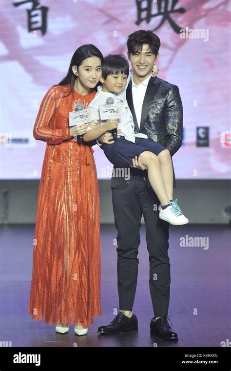 Chinese actress Liu Yifei, left, and actor Yang Yang, right, attend a premiere event for movie ...