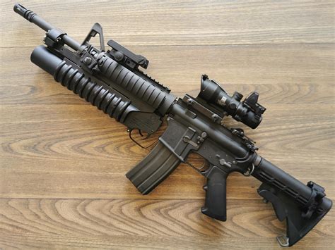 M203 grenade launcher colt marking, barrel mounted on GHK m4a1 gbb, Marine marking, all blackout ...