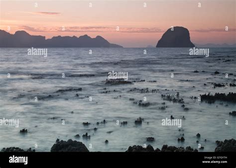 Sunset at beach on an island in Krabi Thailand Stock Photo - Alamy