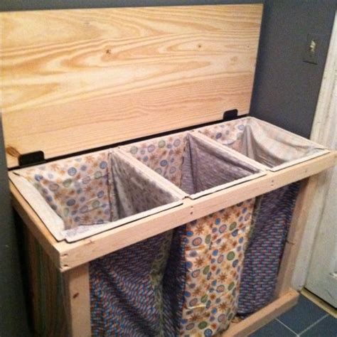 Homemade laundry hamper! Great for the space at the top of the stairs. Pad the top to make it ...