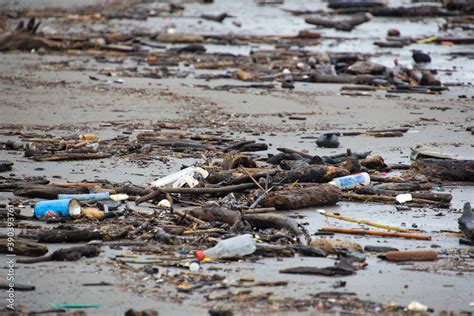 Plastic Trash on a beach Stock Photo | Adobe Stock