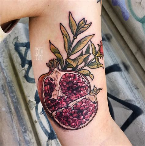 Delicious Pomegranate tattoo on arm by @magda_hanke | Pomegranate tattoo, Tattoos, Ink tattoo