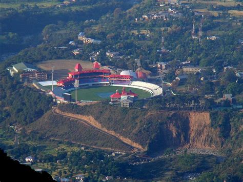 The HPCA Cricket stadium set against the backdrop of the dramatic snow clad mountains, is ...