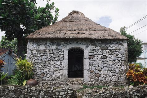 "A Traditional Ivatan House Made Of Stone And Thatched Leaves" by Stocksy Contributor "Lawrence ...