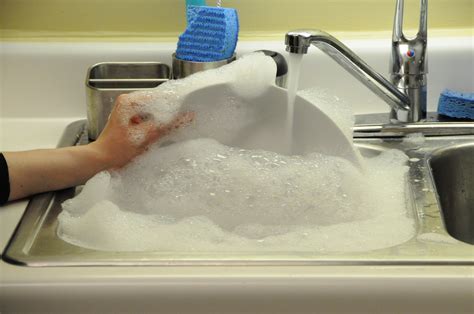 Washing the dishes with soap | Asset used in our ABC House A… | Flickr