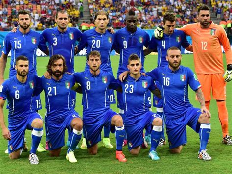 Member of Italy's national football team pose for team photo during a Group D football match ...