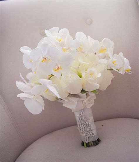 White Orchid bouquet #weddingreception #wedding… | Orchid bouquet wedding, Flower bouquet ...