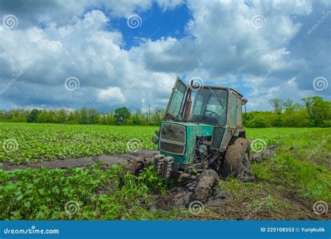 Farm Tractor Stuck in Field Dirt after Rain Stock Image - Image of ploughland, nature: 225108553