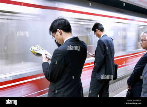 rush hour at subway station, Shinjuku, Tokyo, Japan Stock Photo - Alamy