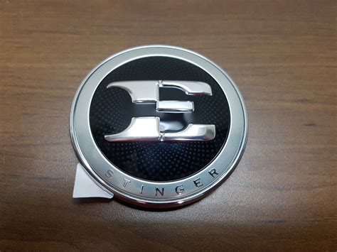 OEM Kia Stinger E Badge Hood Emblem - Kia Stinger dot com