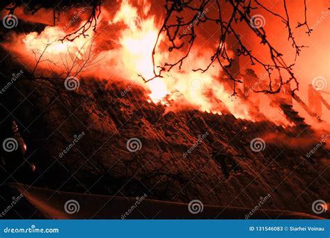 Night Fire. the Roof of the House is on Fire. Winter Stock Image ...