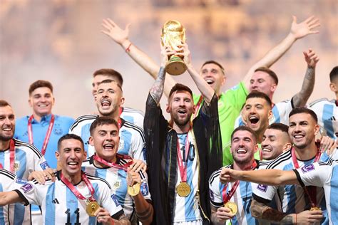 What was Lionel Messi wearing during World Cup trophy lift? - The Athletic