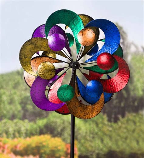 Add beauty and dimension to your yard or garden with our 4-Tier Wind ...