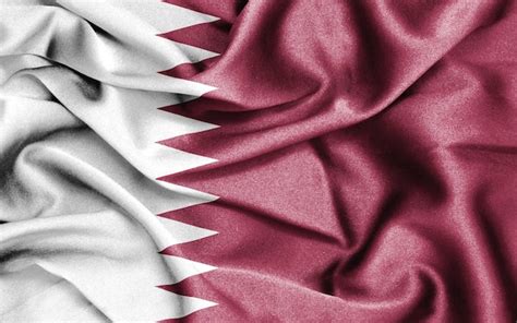 Premium Photo | Fabric texture flag of qatar.