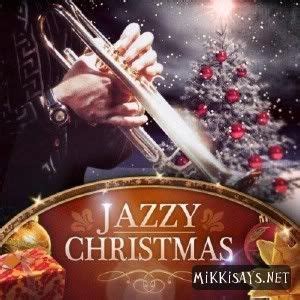 a jazzy christmas album cover with a trumpet in front of a christmas ...