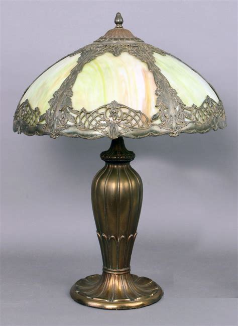 Sold at Auction: Antique slag glass table lamp: an old Miller type, heavy cast metal base ...