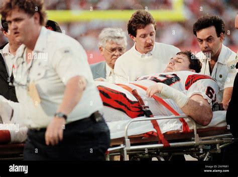 Cincinnati Bengals nose tackle Tim Krumrie, 69, is carried off the field after injuring is leg ...