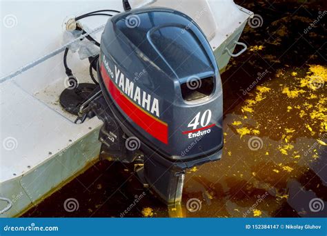 Outboard Motor Yamaha Enduro 40 on a White Boat, Released into the Water. Editorial Photography ...