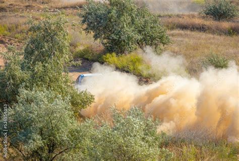 Sports Car on the Turn of the Rally Track and a Lot of Dust 09 Stock Photo | Adobe Stock