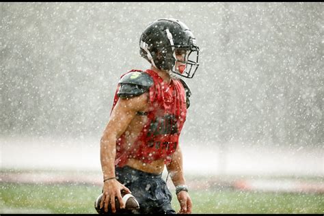 PHOTOS: Madison High School football team practices in the rain ...