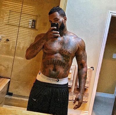 The Game shows off his toned body