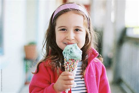 "Cute Young Girl Eating A Big Ice Cream" by Stocksy Contributor "Jakob ...