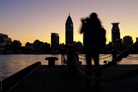 "Silhouette Of Skyscrapers Against Sky During Sunset" by Stocksy Contributor "Rein Cheng" - Stocksy