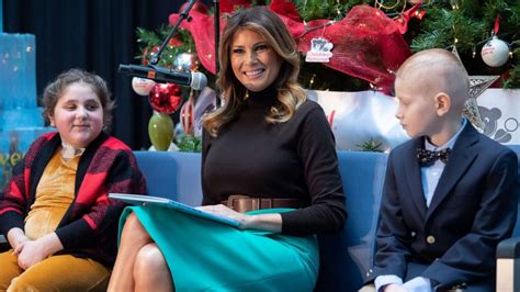 First lady Melania Trump makes annual holiday visit to children's hospital to read to patients ...