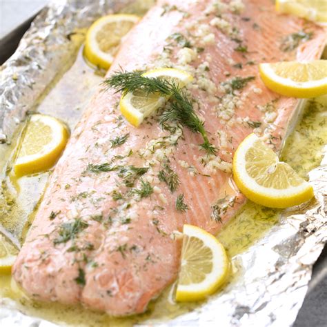 It doesn't get much easier than this Easy 5 Ingredient Baked Salmon with a garlic, lemon, and d ...