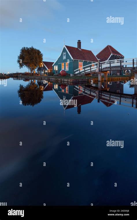 The Zaanse Schans cheese factory reflection on a water Stock Photo - Alamy