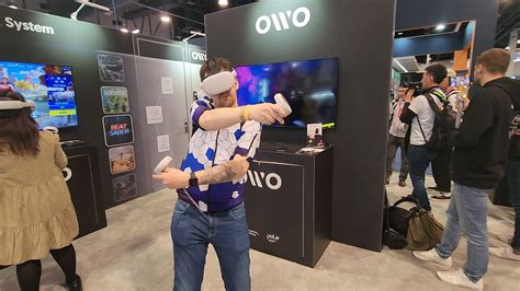 We tried a VR haptic suit that simulates being shot and stabbed at CES ...