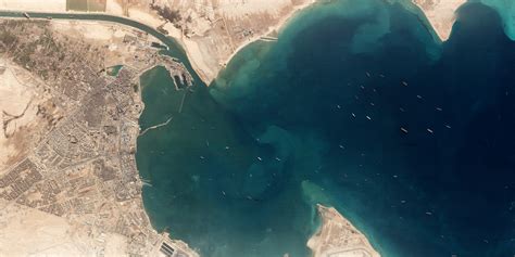 The huge ship stuck in the Suez Canal seen in photos from space | Live ...