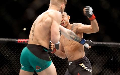 Who beat Conor McGregor for the UFC featherweight and lightweight belts?