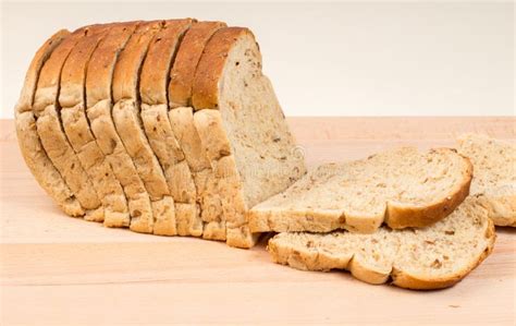 Sliced Seeded Brown Bread Loaf Stock Image - Image of bread, nutrition ...