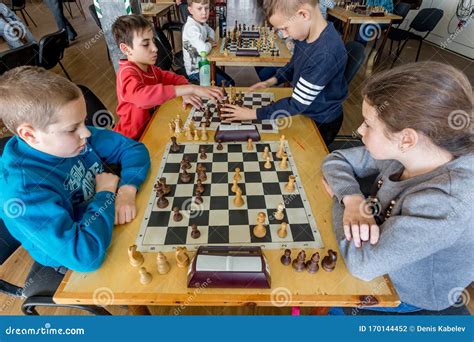 Kids Play Chess during Chess Competition in Chess Club. Education, Chess and Mind Games ...