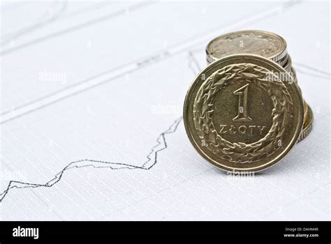 Zloty or PLN coins and stock chart as currency exchange concept Stock Photo - Alamy