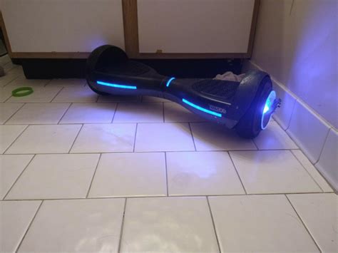 gotrax hoverboard black used with charger completely working