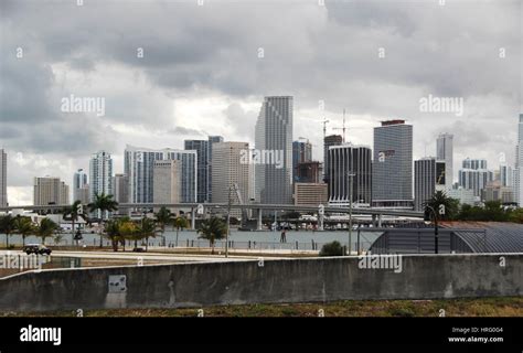 Miami cityscape skyline at dawn sunrise with dark clouds, Florida, USA ...