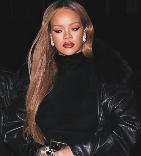 Rihanna Gives Waist-Length Blonde Hair a Thumbs up This Season