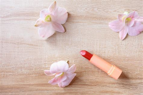 lipstick with beautiful flowers 6204644 Stock Photo at Vecteezy