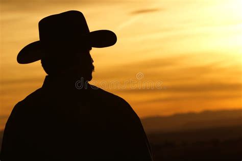 Cowboy Sunset Silhouette stock image. Image of rural - 13785019