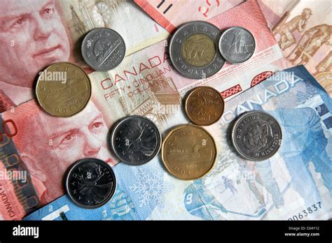 canadian currency including coins and notes Stock Photo - Alamy