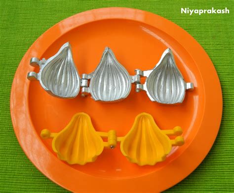 Niya's World: How to prepare Modak using Modak Mould?