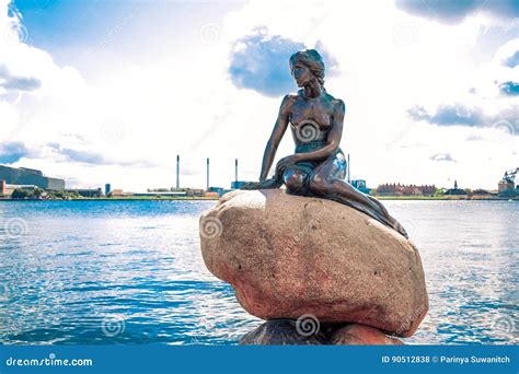 The Little Mermaid Statue By The Waterside At The Langelinie Promenade ...