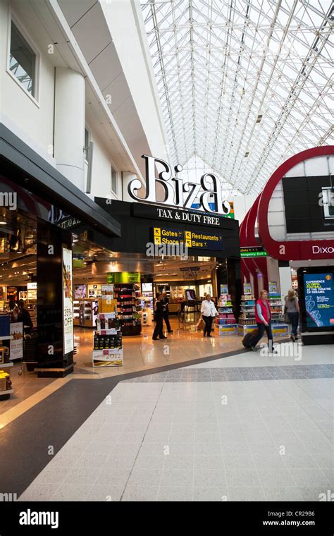 Biza tax and duty free shop in Terminal 2, Manchester Airport, Lancashire, UK Stock Photo - Alamy