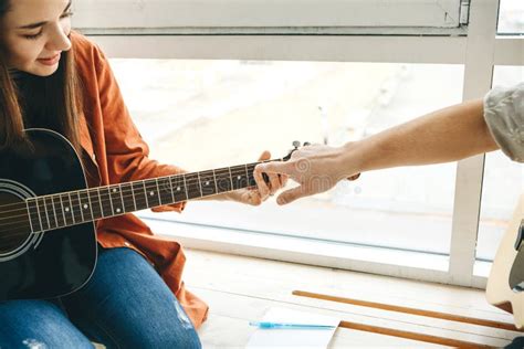 Learning To Play the Guitar Stock Photo - Image of examining, play ...