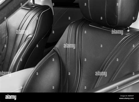 Modern Luxury car inside. Interior of prestige modern car. Comfortable leather seats ...