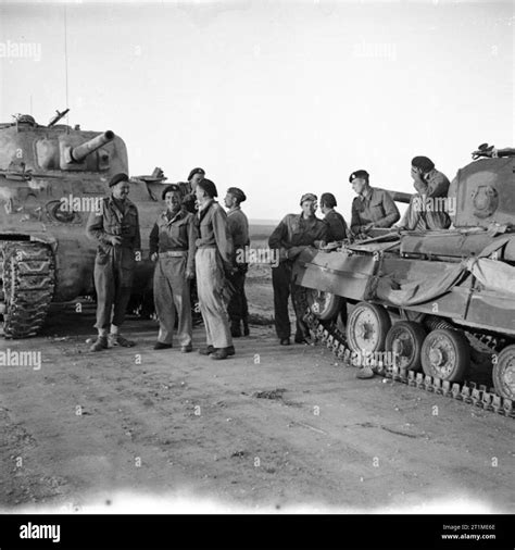 The British Army in Tunisia 1943 A Sherman tank crew greets a Valentine ...