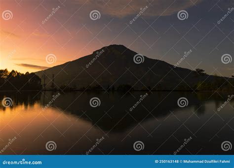 Sunrise with Mount Sumbing with Lake Surface on the Foreground Stock ...